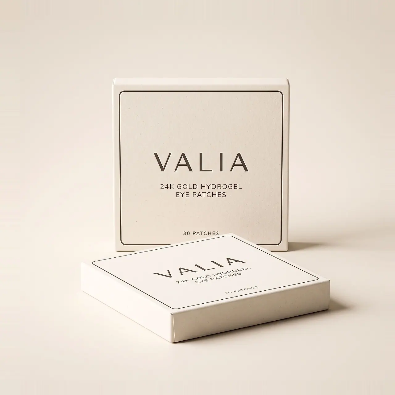 Two identical VALIA boxes on a cream surface, one standing and one lying flat in front of it.